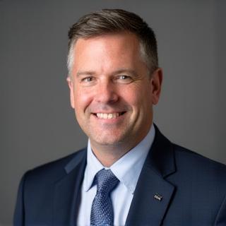 Professional headshot of Thomas Sterling.